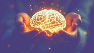 Uma pessoa com um cérebro brilhante e em crescimento em suas mãos, com uma expressão de foco e determinação, simbolizando o cultivo da inteligência emocional.